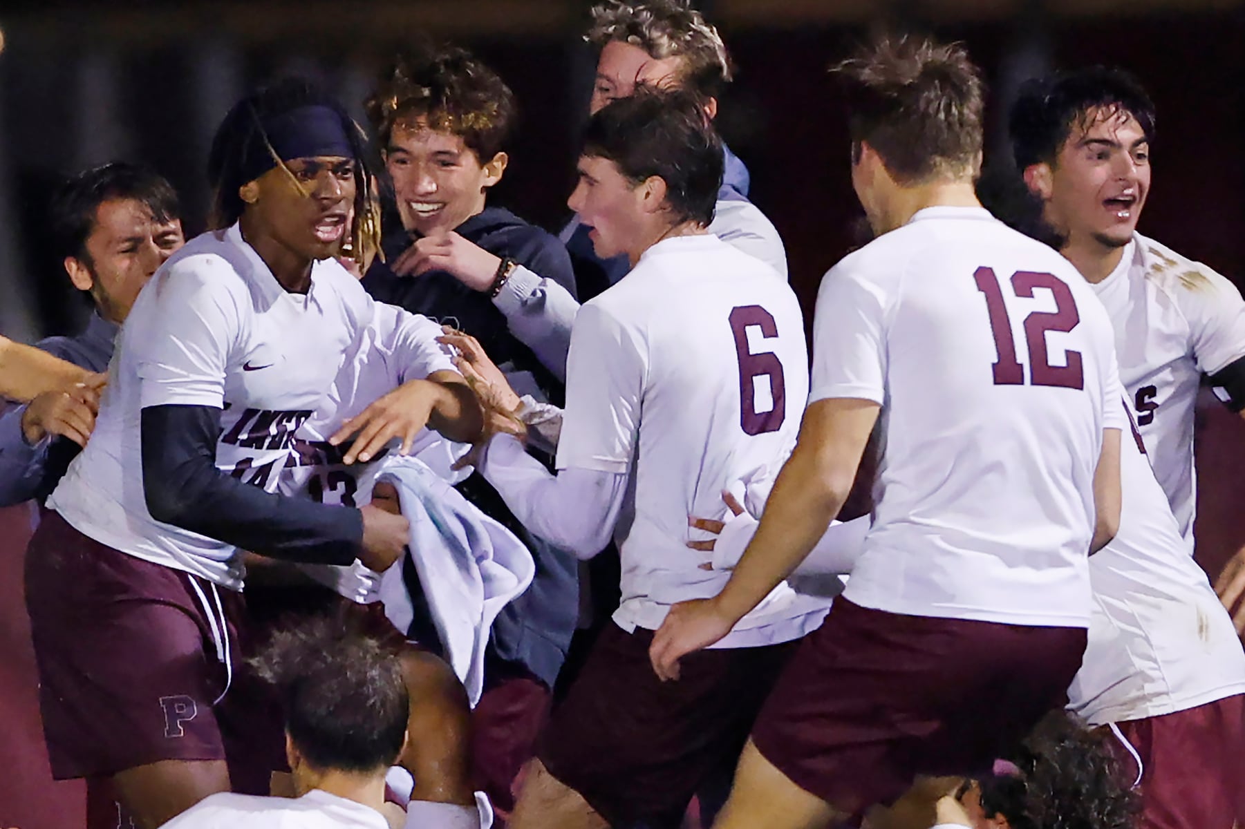 Phillipsburg's Christian Martin (14) celebrates with teammates after scoring the game winning goal in double-overtime against Easton in a boy’s soccer match in Easton on Oct. 13 2025.