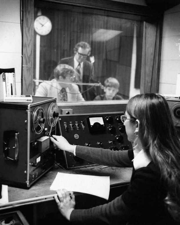 A student operates the audio mixing console and reel-to-reel tape decks in 1970 in the WEPS-FM control room at Elgin High School. (School District U-46)