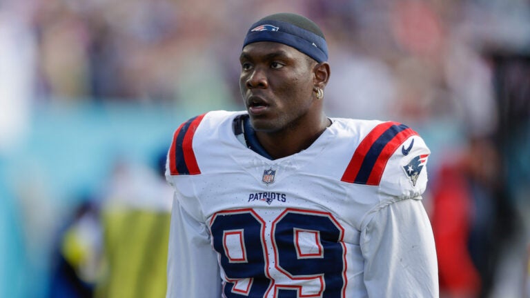 New England Patriots defensive end Keion White (99) walks off the field following an NFL football game against the Tennessee Titans, Sunday, Oct. 19, 2025, in Nashville, Tenn.