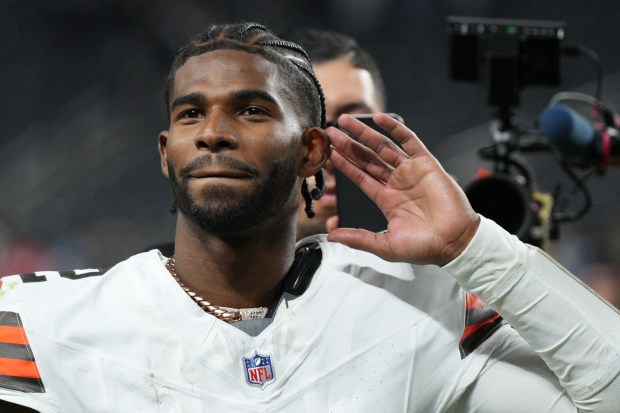 Cleveland Browns quarterback Shedeur Sanders (12) celebrates after the Cleveland Browns defeated the Las Vegas Raiders in an NFL football game Sunday, Nov. 23, 2025, in Las Vegas. (AP Photo/Eric Gay)