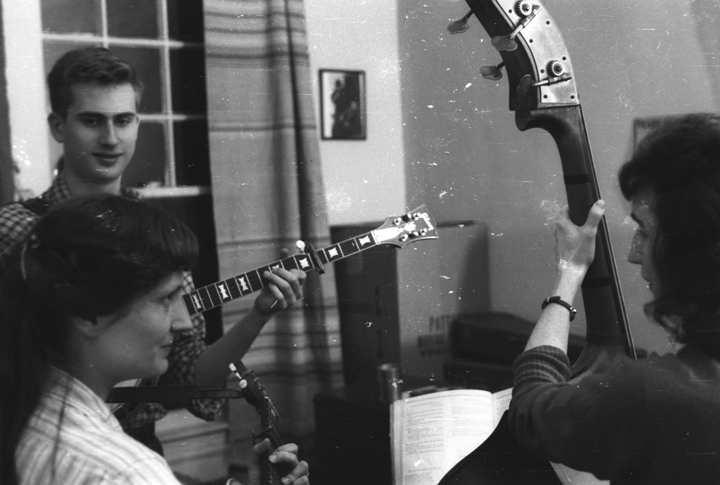 Hazel and me singing at a party at our house in DC, 1962. Rick Churchill is playing the banjo with us. Photo by Jeremy Foster; courtesy Alice Gerrard.