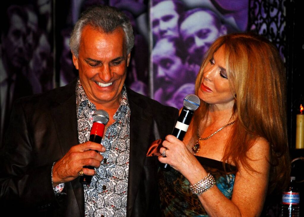 Actor and showman Micheal DeLano, shown with Kelly Clinton-Holmes in this undated photo, died O ...