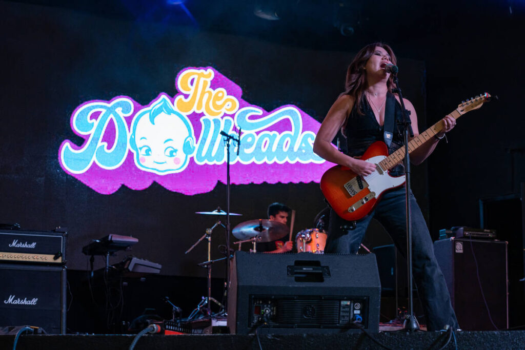 The Dollheads preform on the Main Street stage during the Neon City Music Festival on Fremont S ...