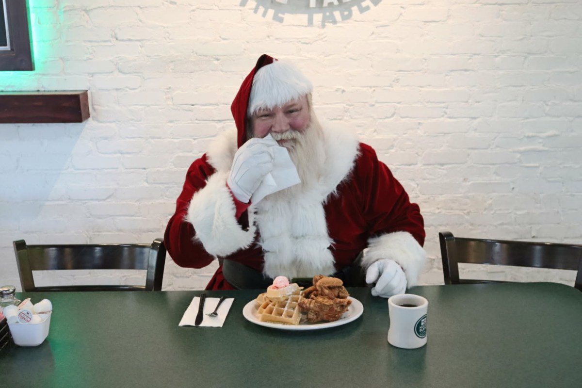 Meet Santa in Birmingham: 25+ events and spots to catch Santa this Christmas season 10 Santa enjoying breakfast at diner.