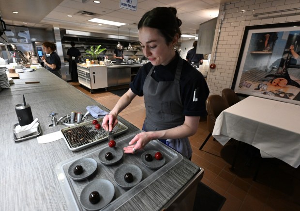 Eliza Reese plates sweets for the evening at Frasca Food and Wine on April 27, 2025. Frasca has been bringing in accolades and awards for more than two decades in Boulder. (Cliff Grassmick/Staff Photographer)