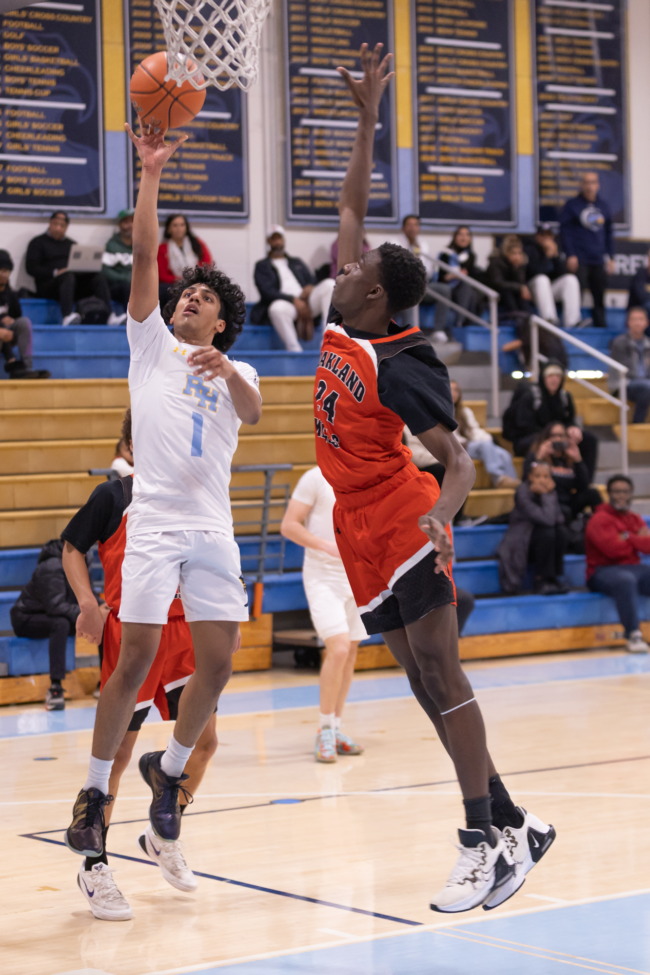 River Hillâs Ethan Makode puts up a floating shot near...