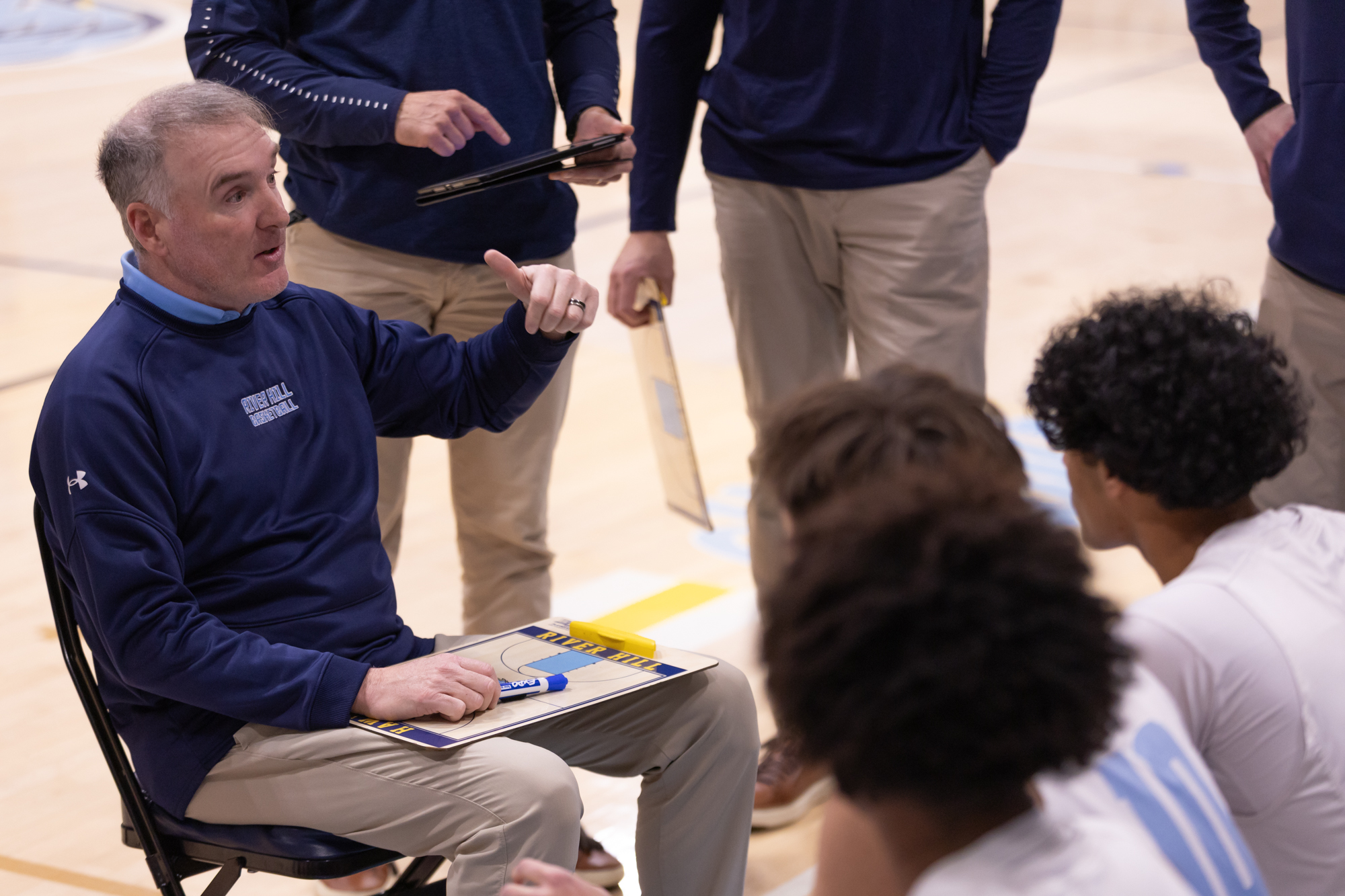 River Hill head coach Matt Graves speaks to the Hawks...