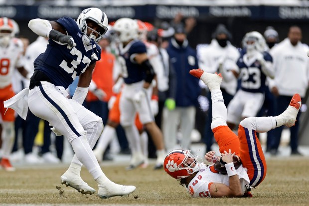 Penn State defensive end Dani Dennis-Sutton celebrates after sacking Clemson quarterback Cade Klubnik in the second quarter of the Pinstripe Bowl on Saturday, Dec. 27, 2025, at Yankee Stadium in New York. (Adam Hunger/AP)
