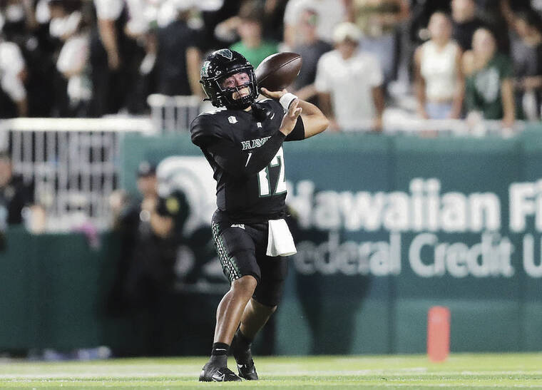 JAMM AQUINO / JAMM.AQUINO@STARADVERTISER.COM
                                University of Hawaii quarterback Micah Alejado throws the football during the first half of a game against the Fresno State Bulldogs at Ching Field on Sept. 20. UH coaches and officials are seeking $5 million in annual public aid to pay student athletes, funds they say will help the universitys programs compete in a modern college sports landscape.