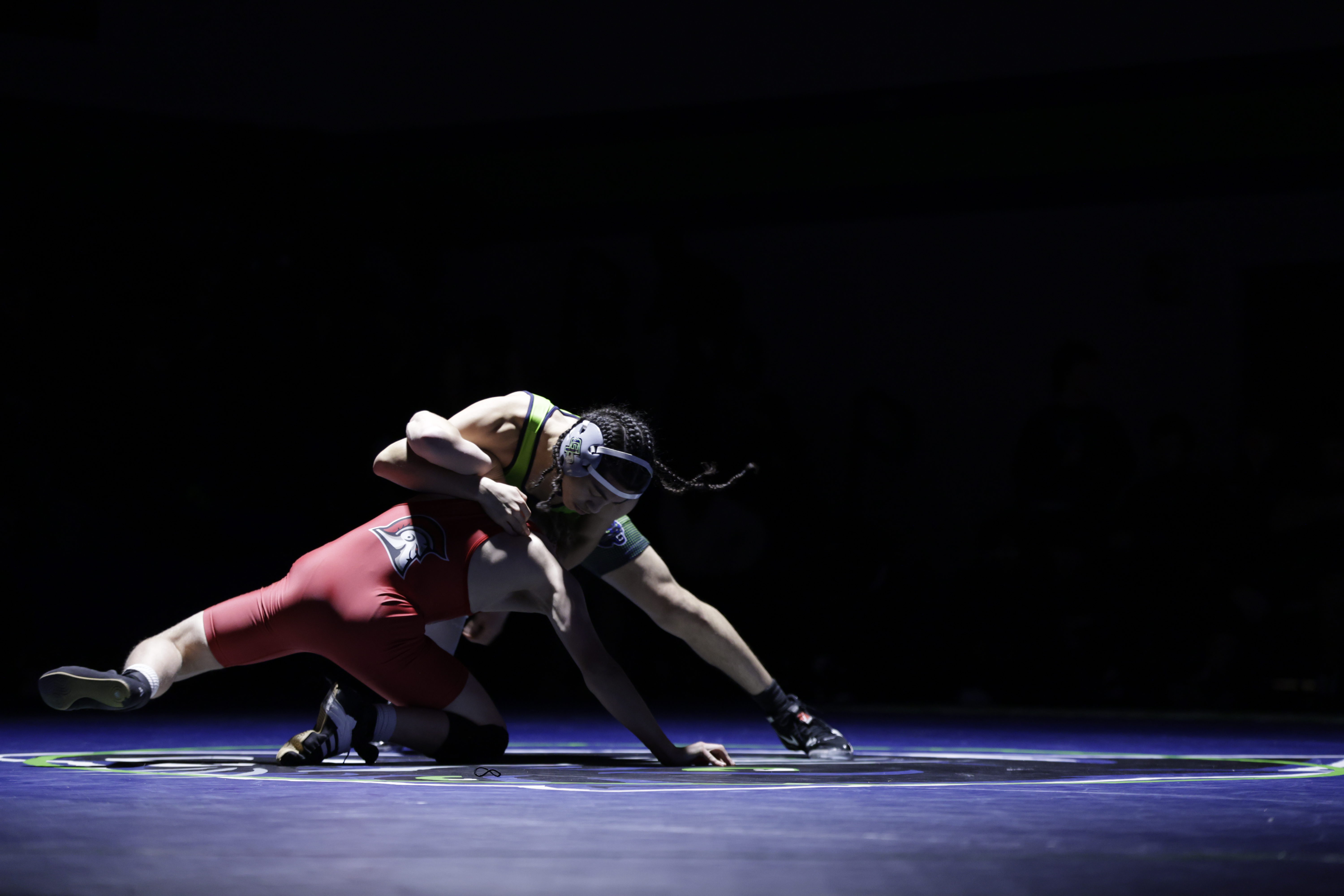 Guilford Parkâs Matthew Perez-Espinoza fights for a hold on Glenelgâs...