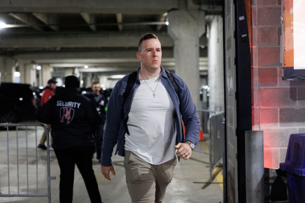 Chicago Bears long snapper Scott Daly walks to the locker room before playing the Green Bay Packers in a NFC wild-card game at Soldier Field Jan. 10, 2026, in Chicago. (Armando L. Sanchez/Chicago Tribune)