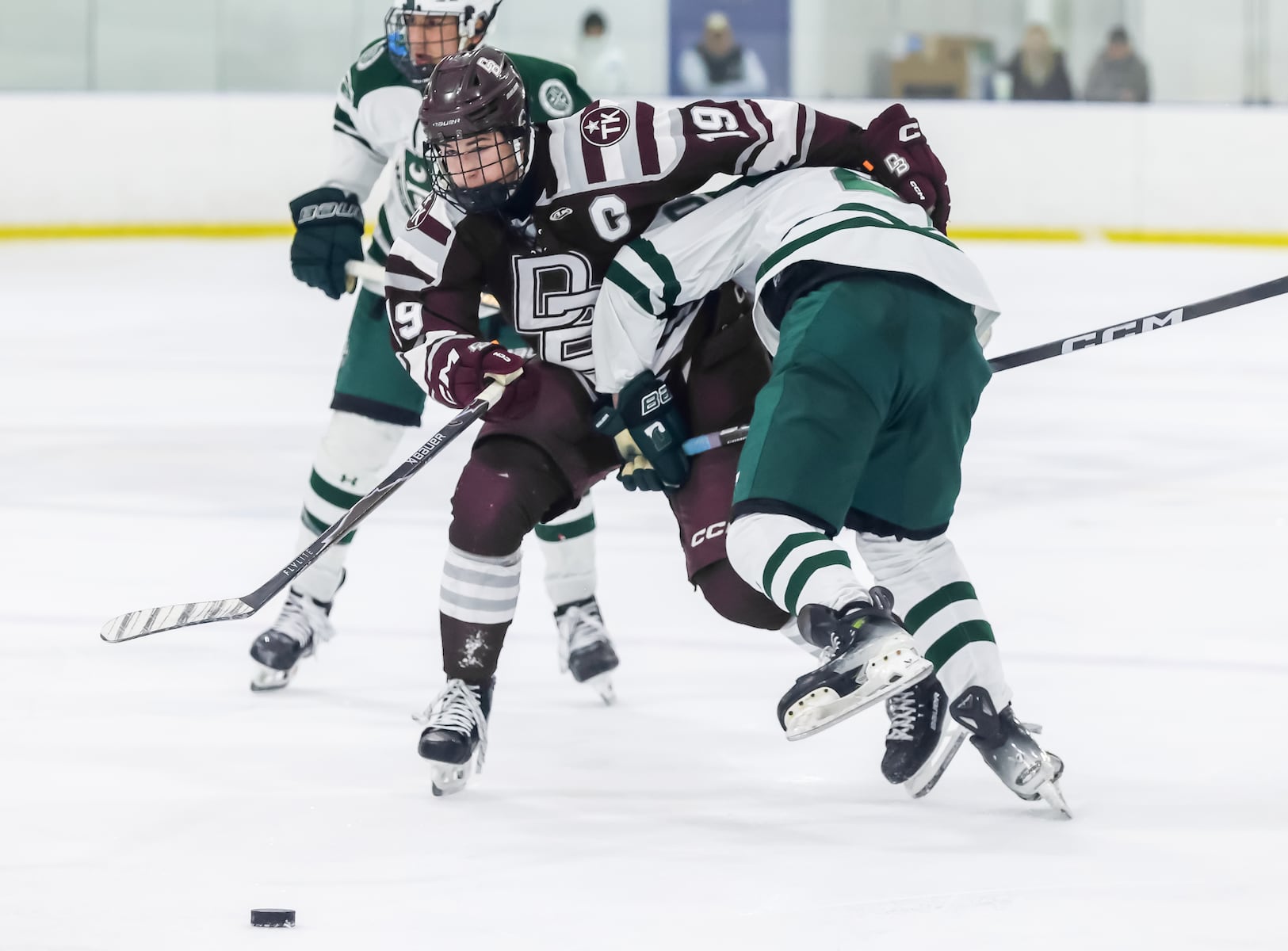 Jack Ashton (19) of Don Bosco Prep fights to get around Jacob Gomez (20) of Delbarton during the ice hockey game at Ice Vault Arena in Wayne, NJ On Sunday, January 11, 2026.