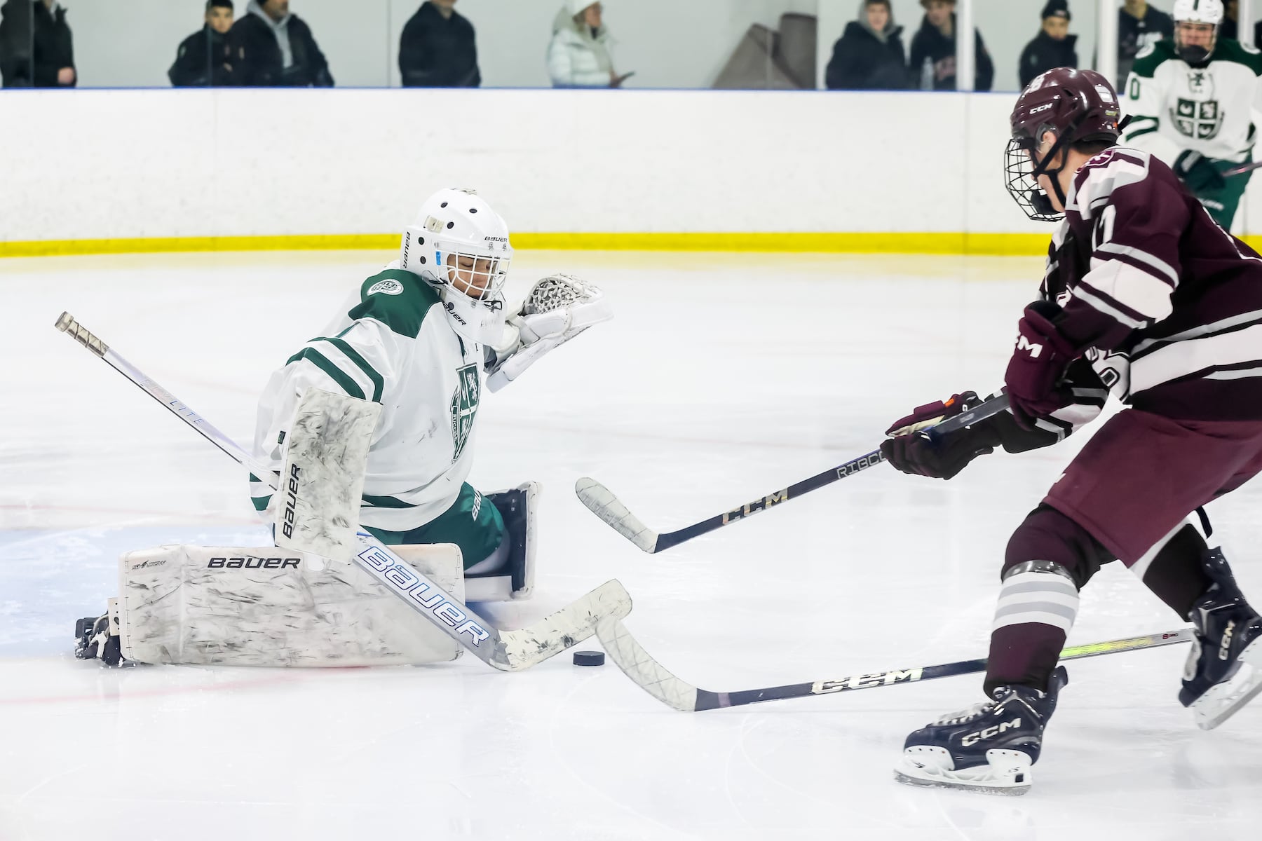 Paul Insauto (1) of Delbarton makes a save against Chris Conklin (17) of Don Bosco Prep during the ice hockey game at Ice Vault Arena in Wayne, NJ On Sunday, January 11, 2026.