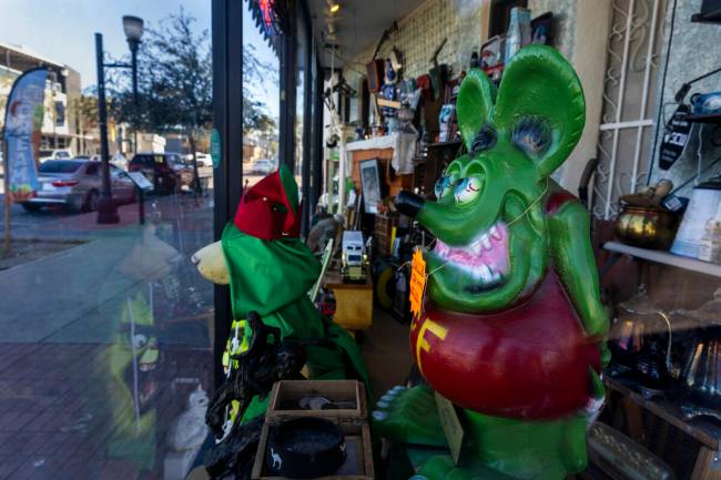 A variety of interesting items are available for sale in the window of the Gold Casters Jewelry ...