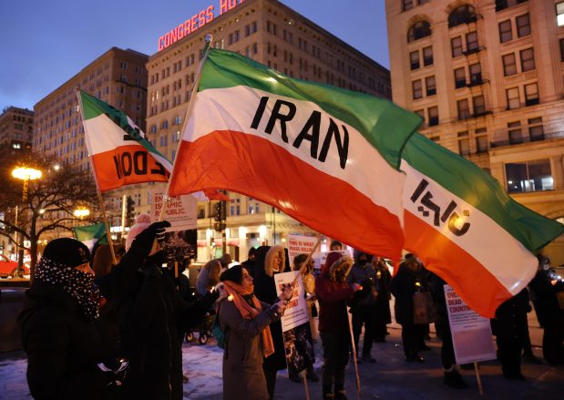 People gather in downtown Chicago on Jan. 17, 2026, to protest the Iran government's killing of protesters and general crackdown. (Chris Sweda/Chicago Tribune)