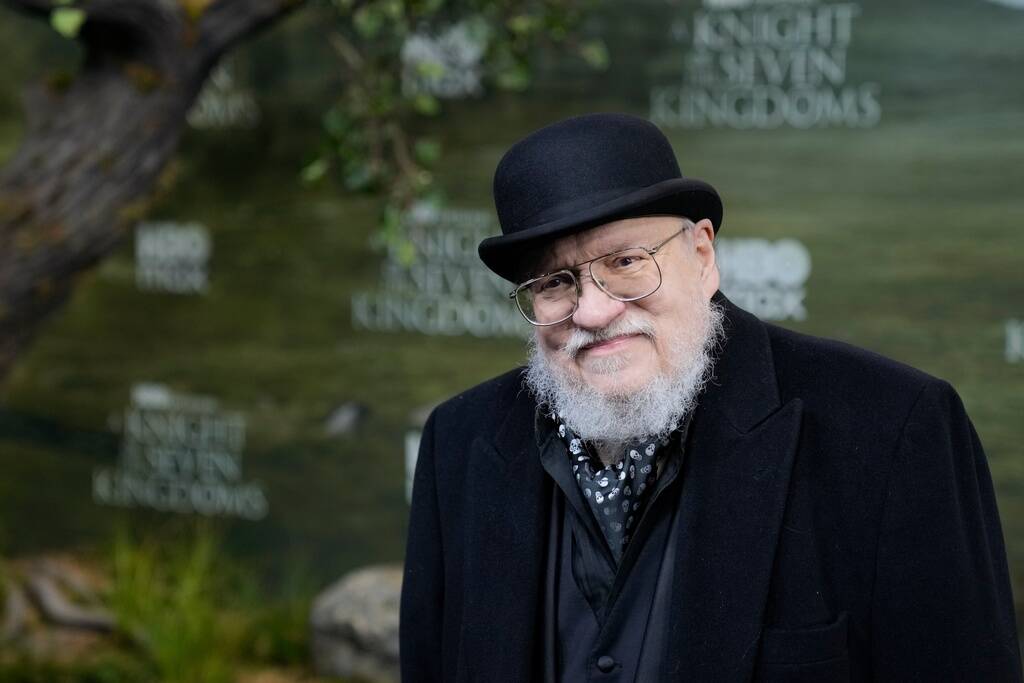 George R. R. Martin poses for photographers upon arrival at the World premiere of "A Knigh ...
