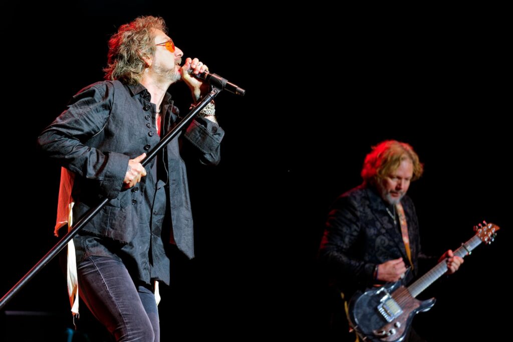 Chris Robinson, left, and Rich Robinson of The Black Crowes perform in 2025. The band's 2026 tour includes Alabama shows in Birmingham and Orange Beach. (Photo by Rob Grabowski/Invision/AP)