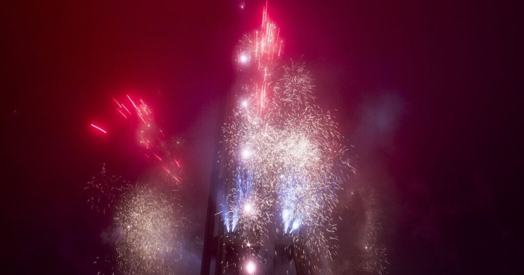 Fireworks at the Seattle Space Needle obscured by fog to ring in 2026