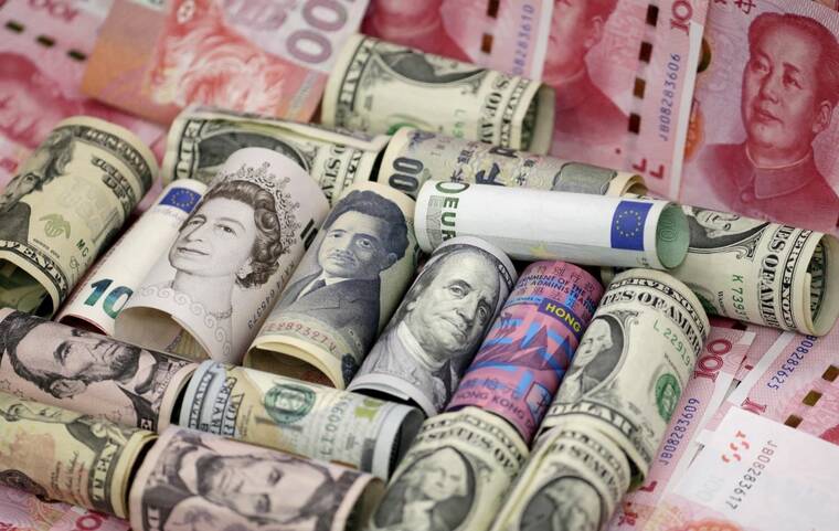 Dollar slips as euro, Swiss franc rally on Fed independence fears