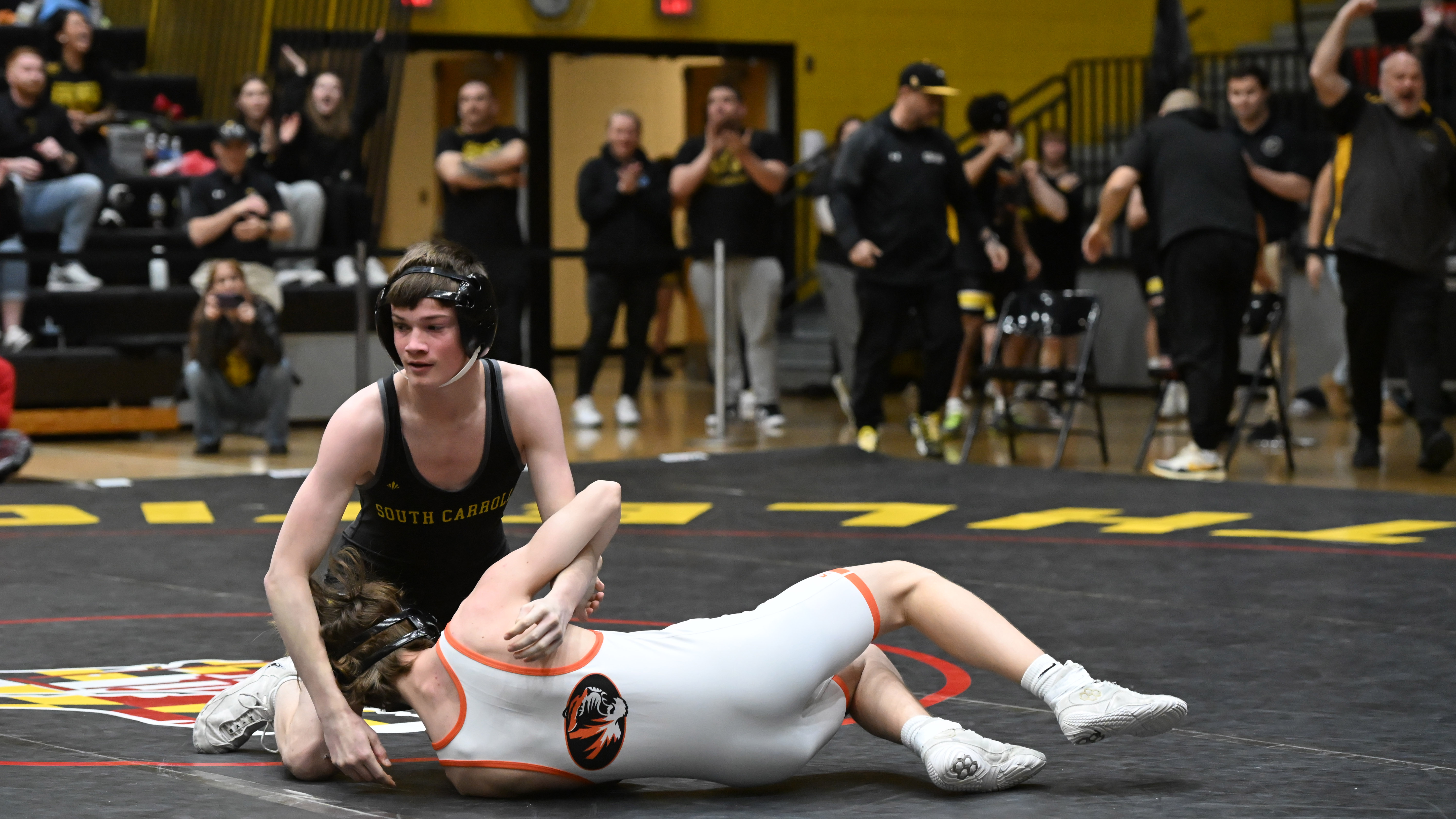 South Carroll's Jake Simione pins Rising Sun's Warren Billingsly in...