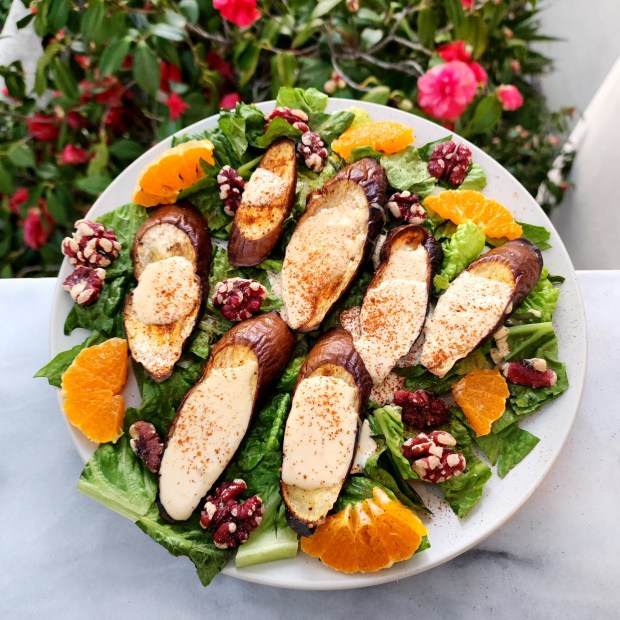 Roasted Eggplant Salad with Tangerine Tahini balances sweet tangerine juice with lemon juice, minced garlic, salt and red pepper powder. (Photo by Yakir Levy)