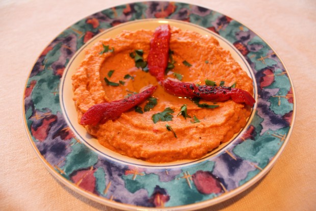 Red Pepper Baba Ghanoush is made with roasted Chinese eggplant, tahini sauce, roasted peppers and labneh. (Photo by Yakir Levy)