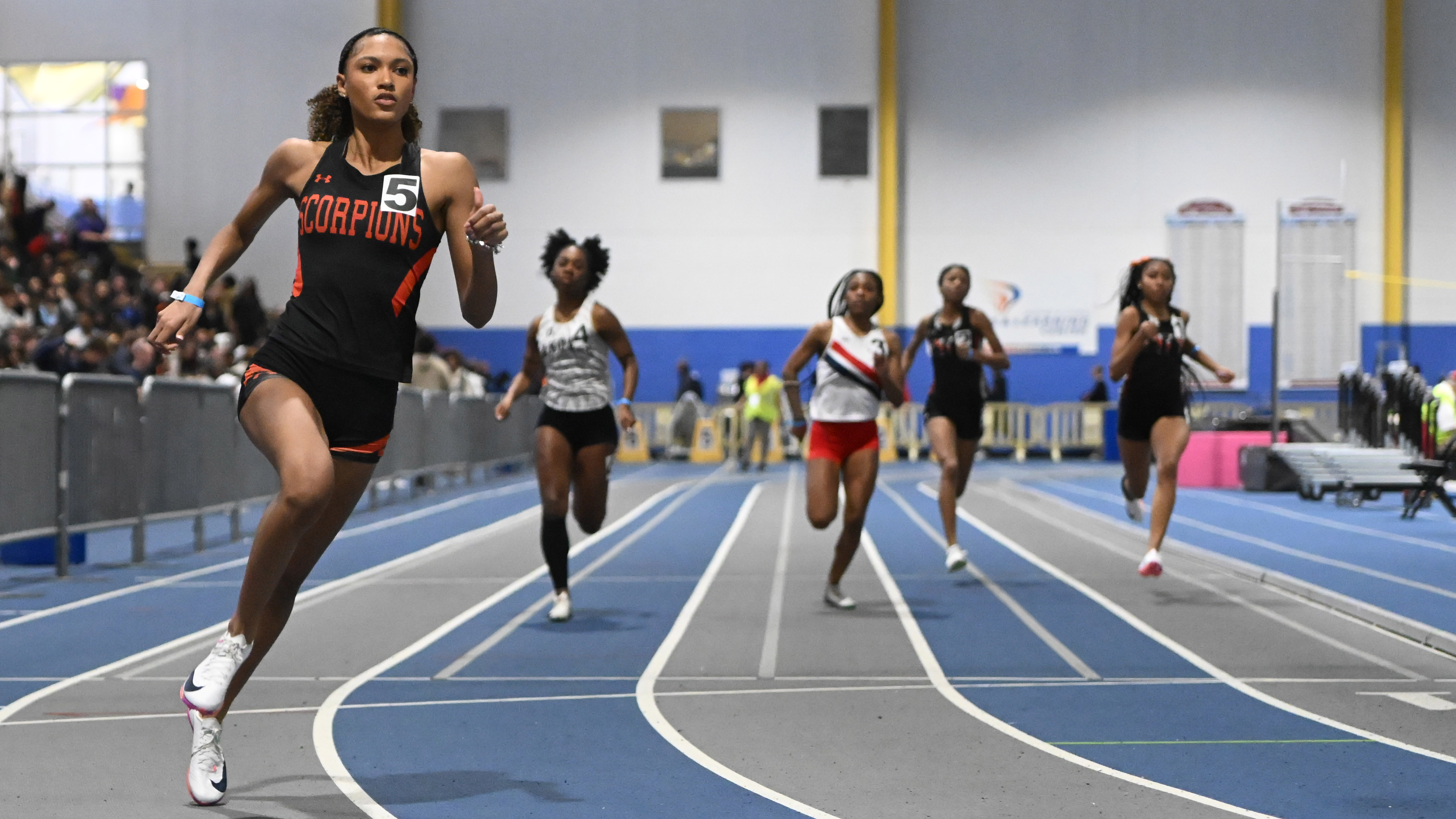 Oakland Mills' Payton Buchanan competes in the 3A girls 500 meter run during the track and field state championships at Prince Georges' Sports Complex on Wednesday. (Brian Krista/Staff)