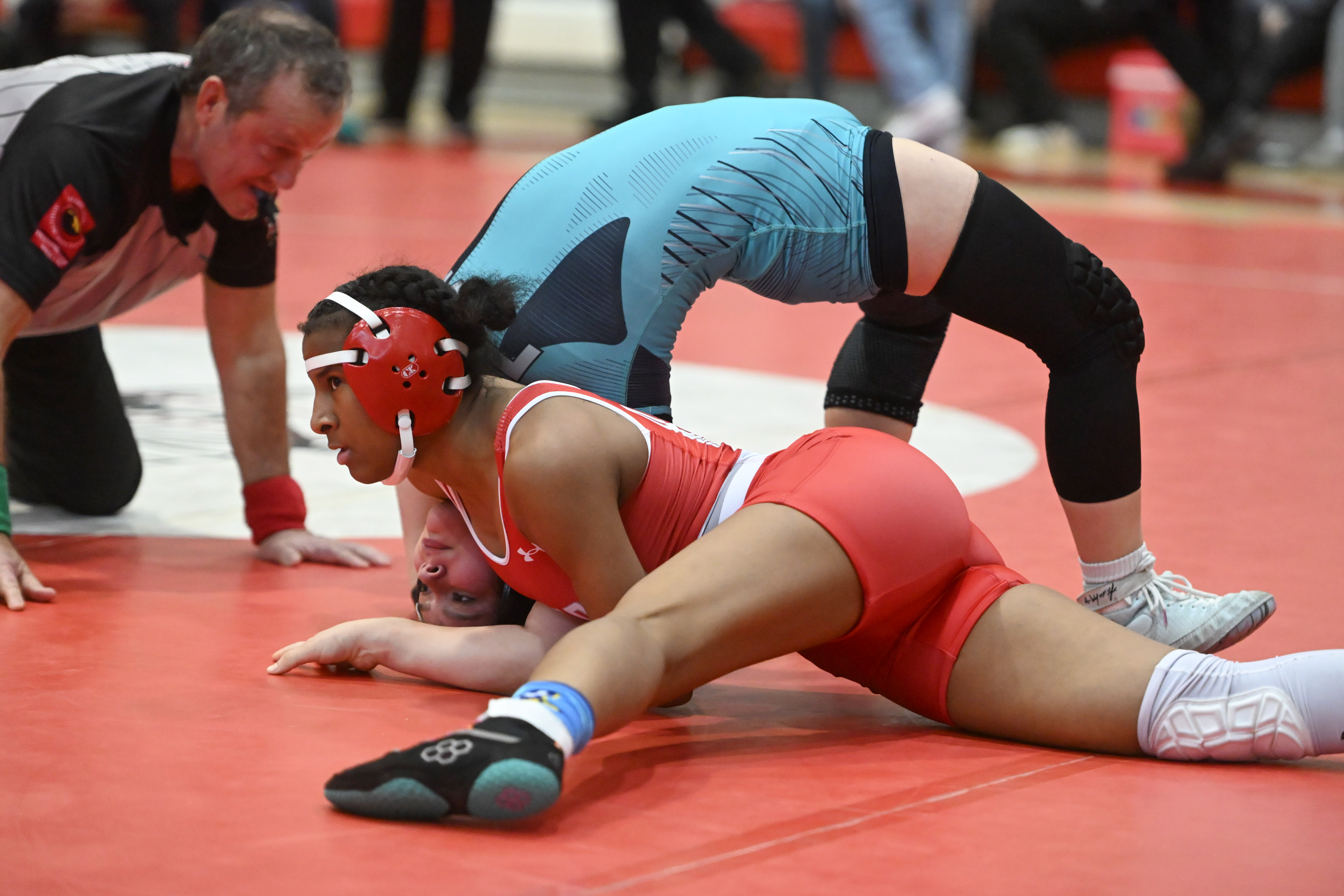 Edgewood's Triniti Green tries to pin Patterson Mill's Kylie Buehler in the girls 130 pound final during the UCBAC wrestling championships at Edgewood High School on Saturday. (Brian Krista/Staff)