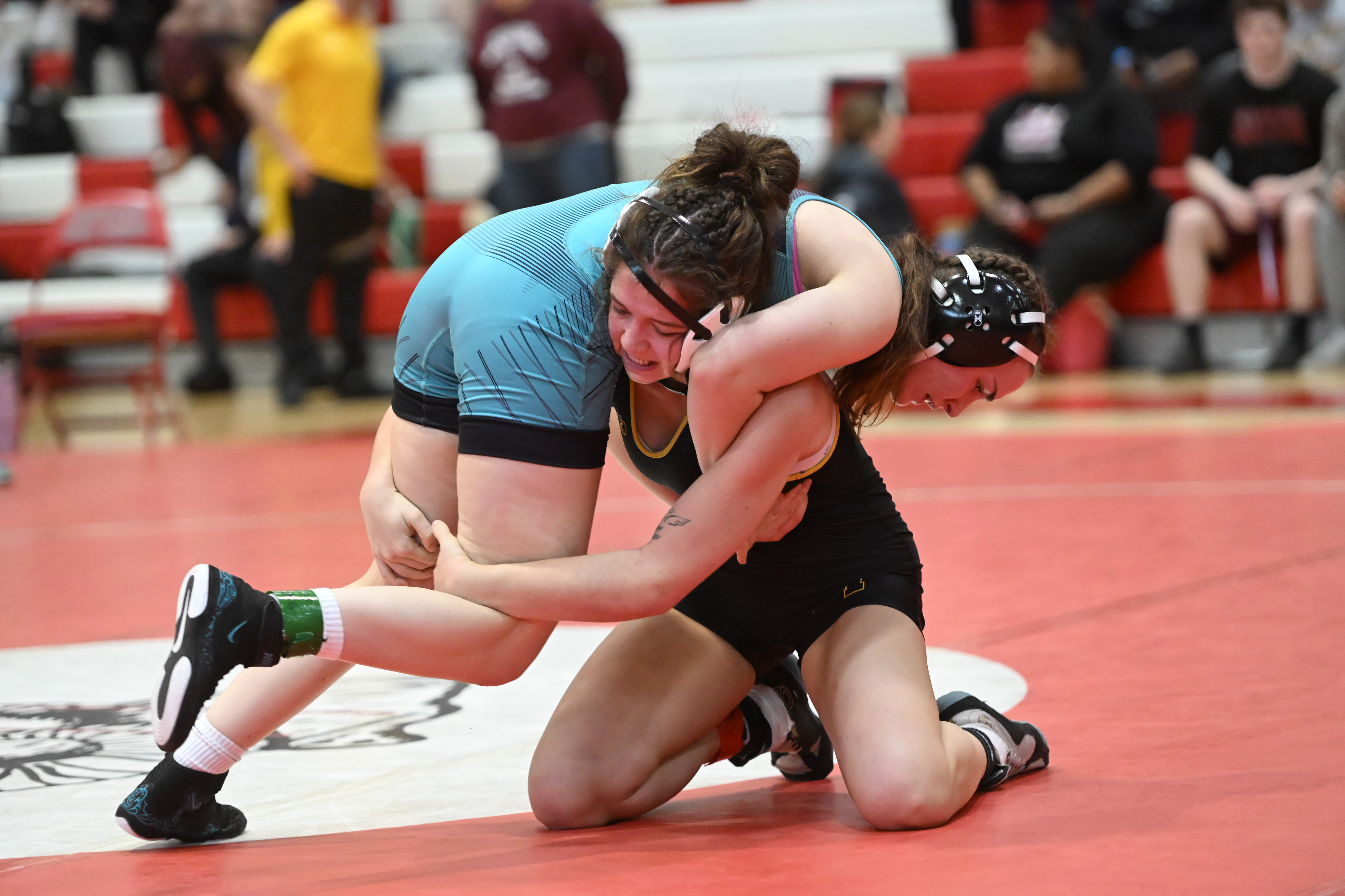 Patterson Mill's Aubrey Goble and Harford Tech's Rylee Quigley compete in the girls 140 pound final during the UCBAC wrestling championships at Edgewood High School on Saturday. (Brian Krista/Staff)