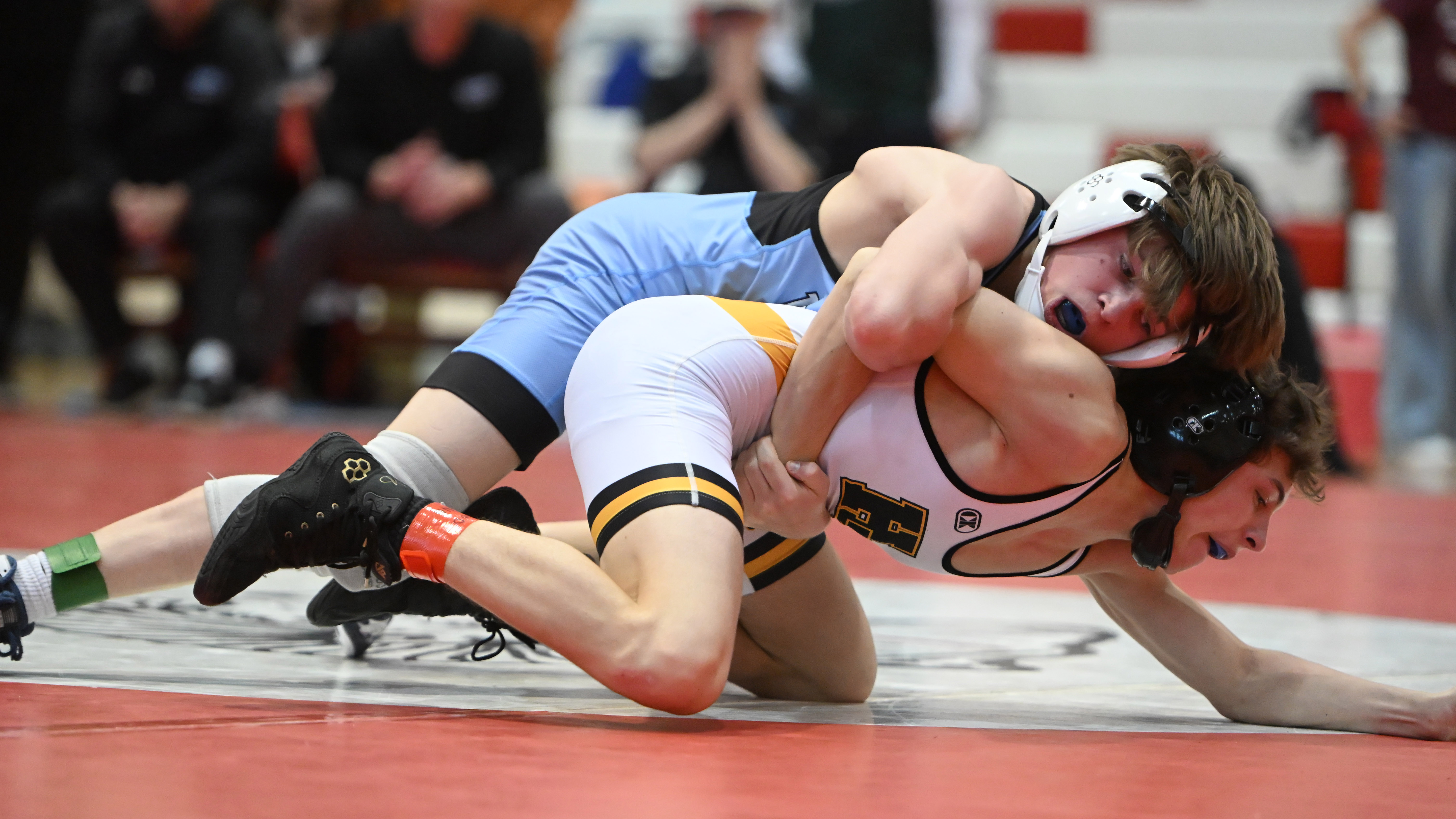 C. Milton Wright's Lucas Heffner controls Harford Tech's Luca Tucciarella in the 106 pound final during the UCBAC wrestling championships at Edgewood High School on Saturday. (Brian Krista/Staff)