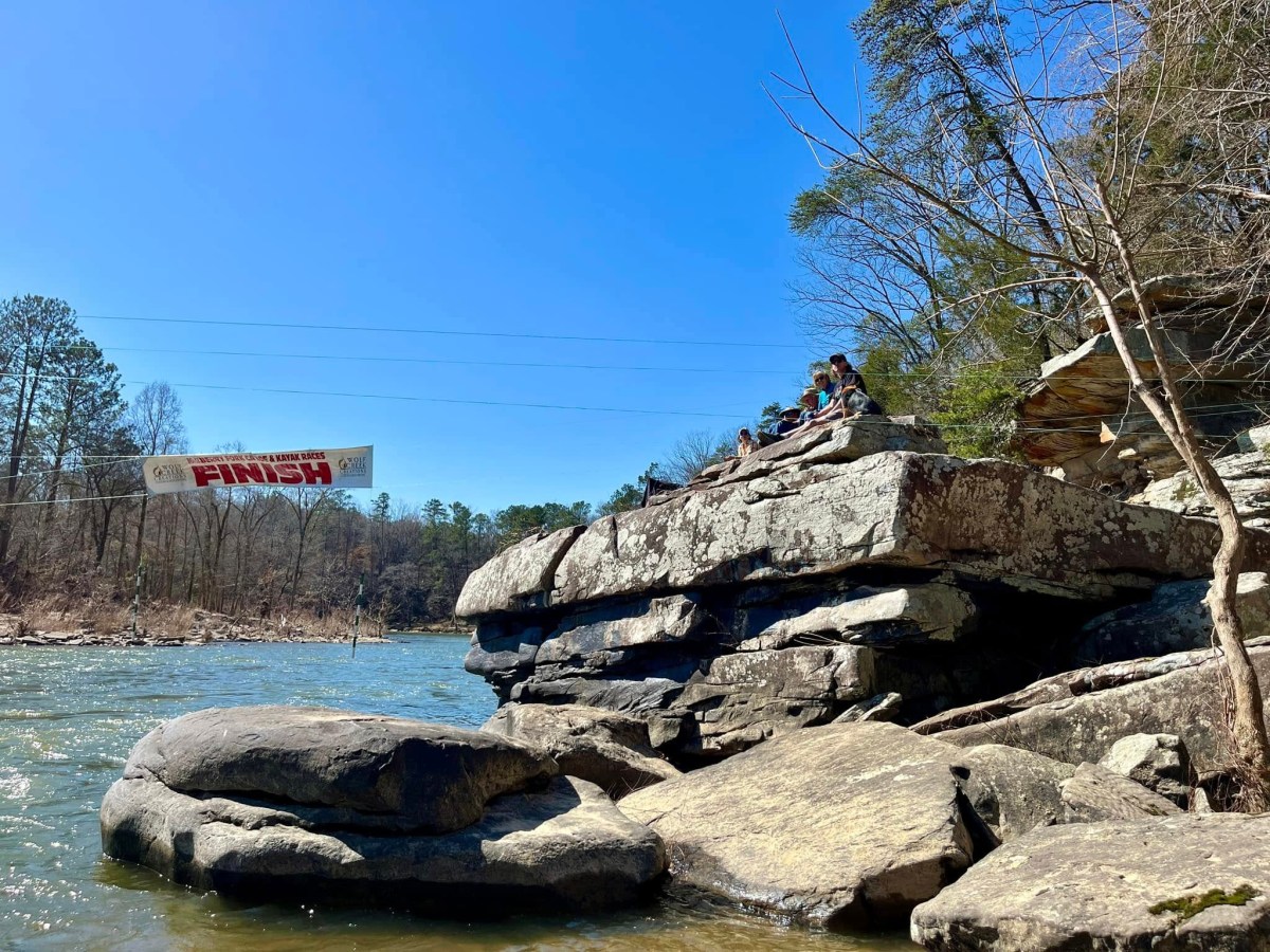 Riverside finish line with spectators