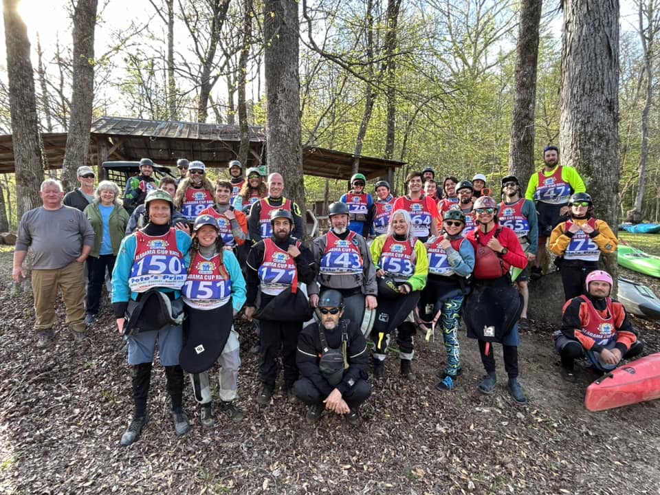Group of kayakers in forest