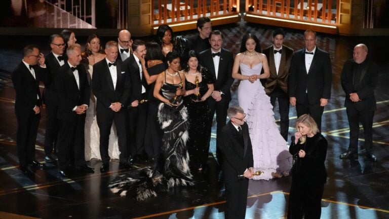 Paul Thomas Anderson, left center, Sara Murphy, right center, and the team from "One Battle After Another" accept the award for best picture during the Oscars on Sunday, March 15, 2026, at the Dolby Theatre in Los Angeles.
