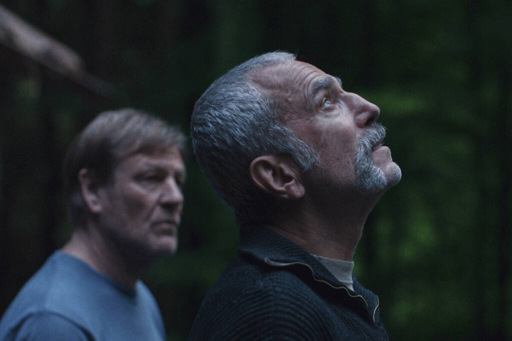 This image released by Focus Features shows Sean Bean, left, and Daniel Day-Lewis in a scene fr ...