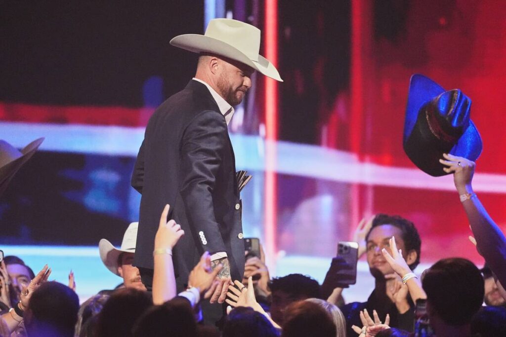 Cody Johnson accepts the award for entertainer of the year during the 61st annual Academy of Co ...
