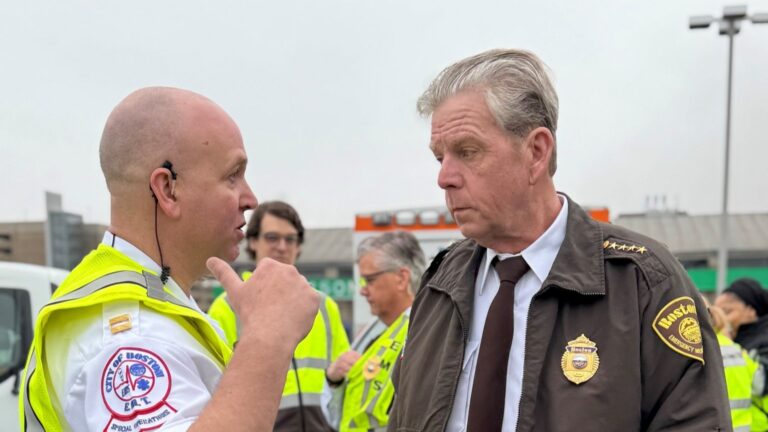 Gill (right) died Saturday after 40 years of service for Boston EMS.