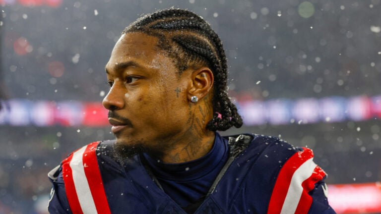 New England Patriots wide receiver Stefon Diggs (8) reacts after defeating the Houston Texans in an NFL divisional playoff football game, Sunday, Jan. 18, 2026, in Foxborough, Mass.