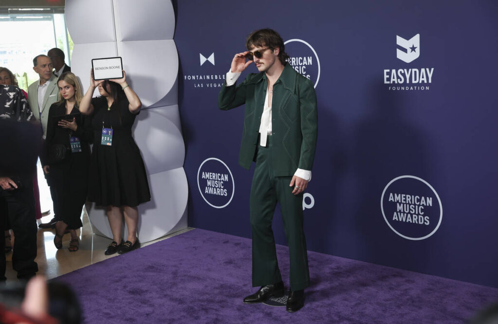 Benson Boone walks the red carpet for the American Music Awards at Fontainebleau on Monday, May ...