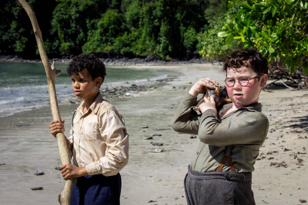 This image released by Netflix shows Winston Sawyers, left, and David McKenna in a scene from & ...