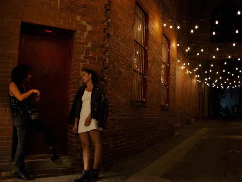 Actresses Nicolette Pearse and Chelsea Gilligan stand near Alley Twenty-Six in "Everything & the Universe." Photo courtesy Shot of Tea.