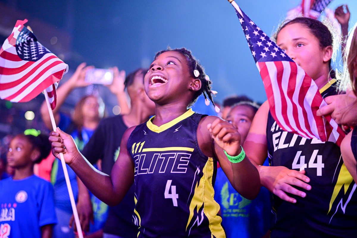 20 weekend events including the Alabama State Games (June 12-14) 2 Young athletes in "Elite" jerseys wave American flags and cheer during the Alabama State Games Opening Ceremony Parade of Athletes