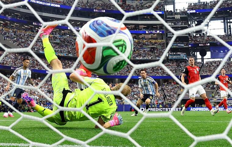 REUTERS/HANNAH MCKAY
                                Argentinas Lionel Messi scores their first goal, today, past Austrias Alexander Schlager at Dallas Stadium, Arlington, Texas, at the FIFA World Cup 2026.