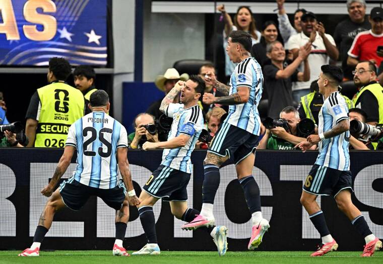IMAGN IMAGES VIA REUTERS/MARIA LYSAKER
                                Argentinas Lionel Messi celebrates scoring their first goal with Enzo Fernandez, Facundo Medina and Thiago Almada at Dallas Stadium, Arlington, Texas, at the FIFA World Cup 2026.