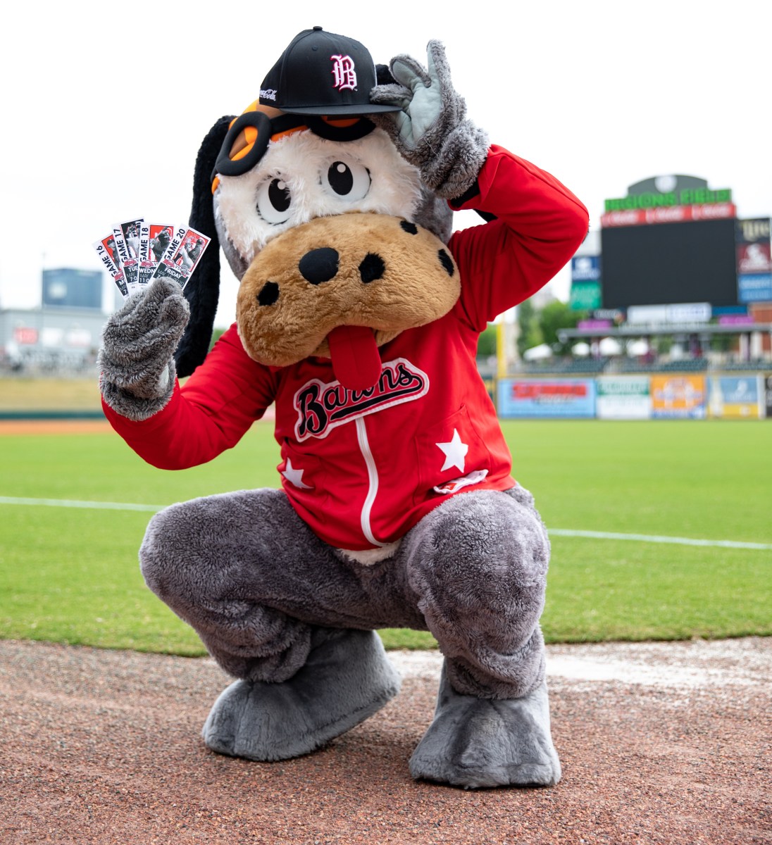 39 July events to experience—festivals, firework shows + more 5 Birmingham Barons mascot holding game tickets on the field at Regions Field