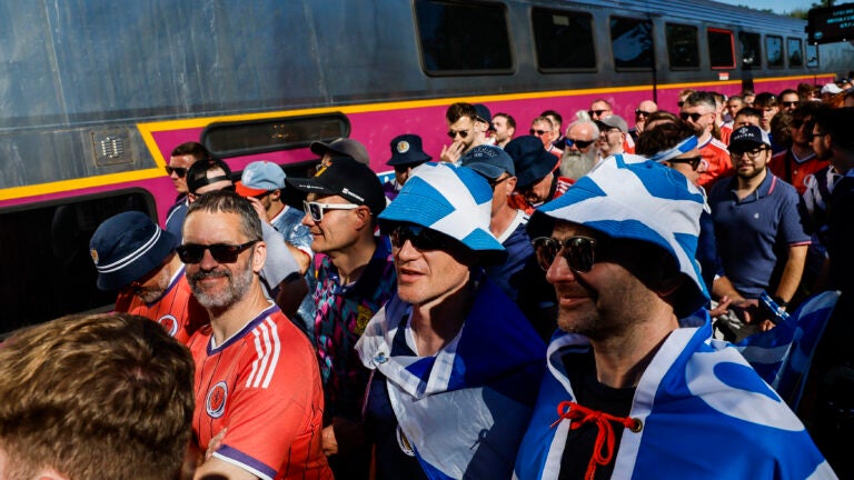 Scottish soccer supporters arrive at Foxborough Station ahead of the 2026 World Cup match between Scotland and Haiti at Boston Stadium.