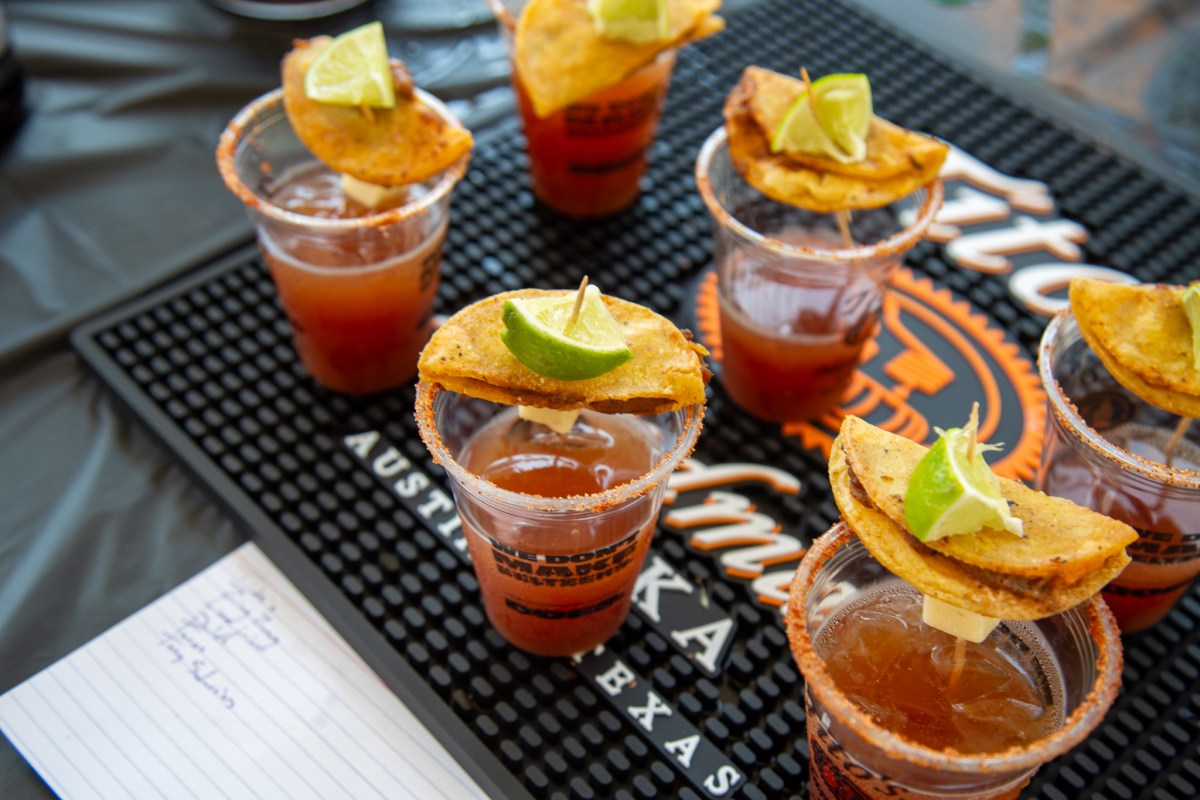 FREE Dragon Boat Race and Festival returns Aug 8—how to experience it 8 Cocktail contest entries garnished with lime wedges and tortilla chips displayed on a bar mat at the Dragon Boat Festival