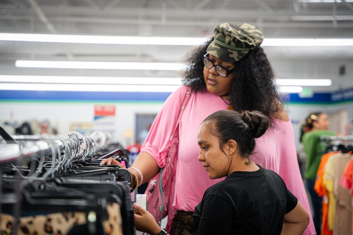 See thrifted looks strut the runway + support a great cause—Aug. 26 5 Designer Jordan Kearri (Moochie) and Alabama Goodwill employee Cuca Keeder browse clothing racks at a Goodwill store