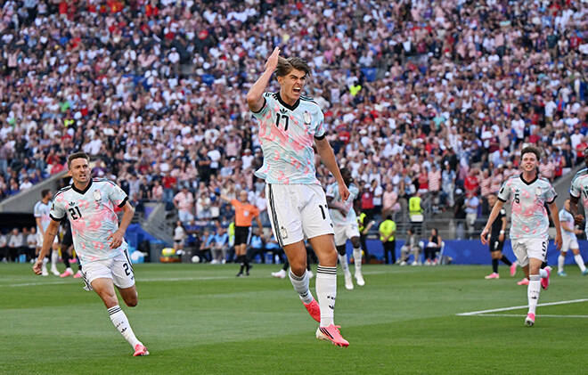 STEVEN BISIG / IMAGN IMAGES
                                Belgiums Charles De Ketelaere celebrates the first of his two goals in the round of 16 World Cup match against the United States in Seattle today. Belgium defeated the United States, 4-1.