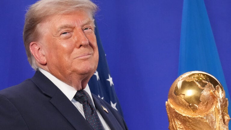 Trump celebrates the World Cup as a US victory as he presents trophy to the winner, Spain