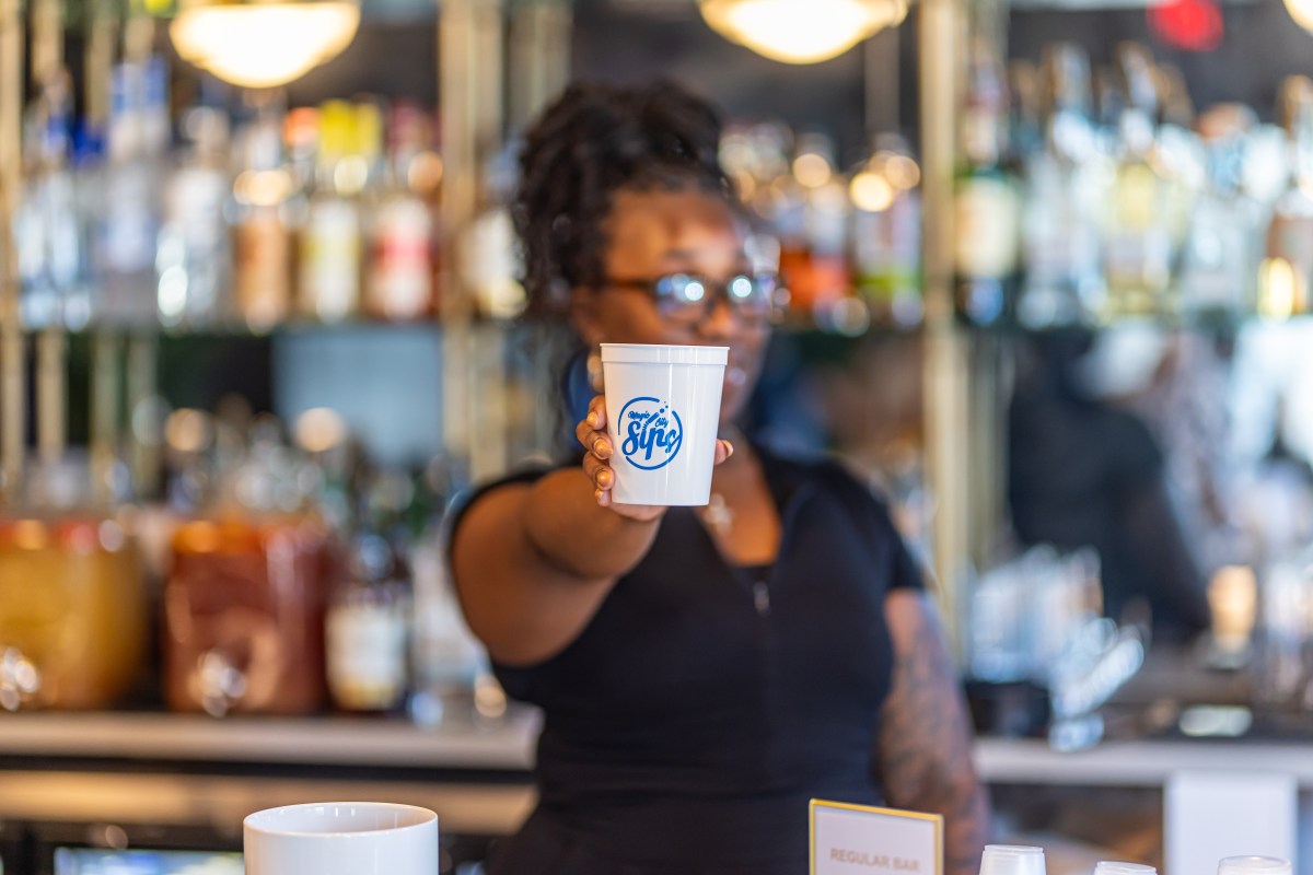This free event kicks off more smart ways to promote our food scene—Thursday Aug. 13, 2026 2 bartender holding cup out in front of themselves